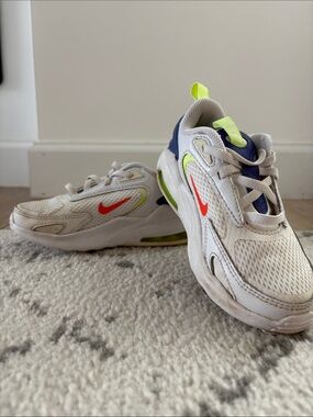 Nike Kids White Sneakers with Neon Orange and Lime Accents